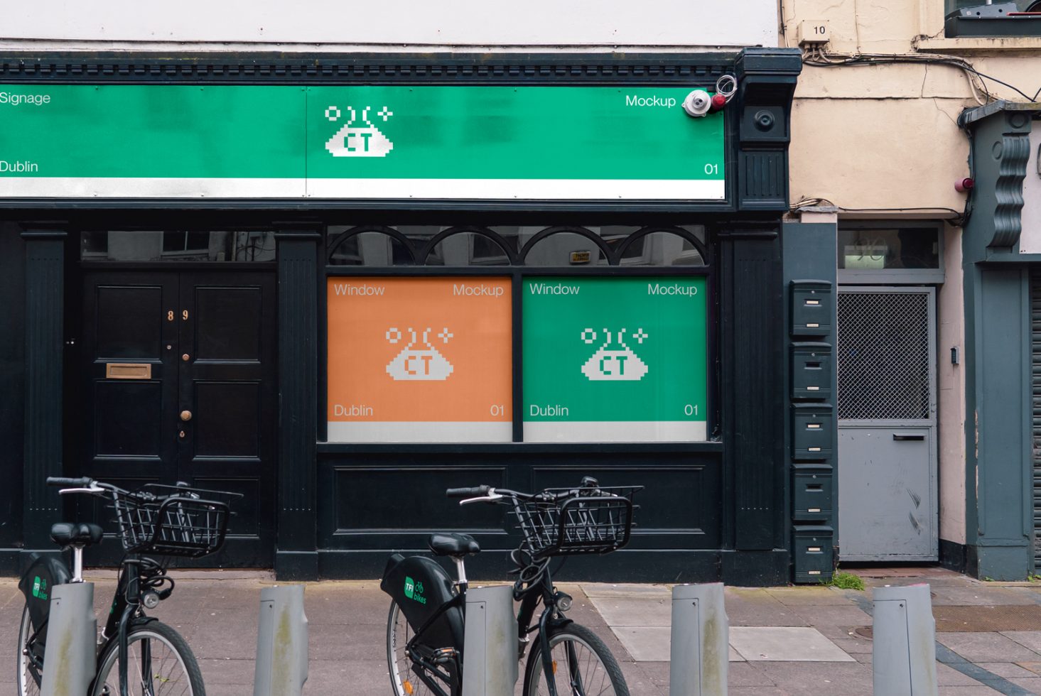 Storefront mockup in urban setting with bike rack, ideal for presenting retail designs and branding to clients in a realistic environment.